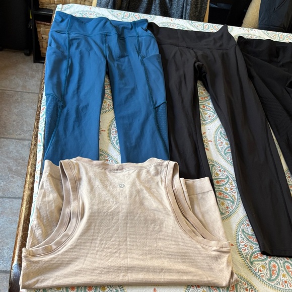LULULEMON ladies LOT (7) LEGGINGS (1) REVERSIBLE JACKET (2) TOPS (1) BRA—SIZE 4 - Picture 2 of 16